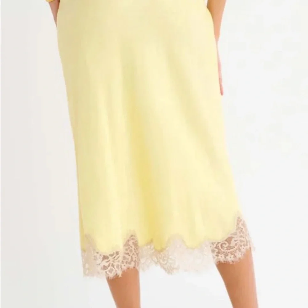 Rumored Pale Yellow Midi Skirt with Lace Hem